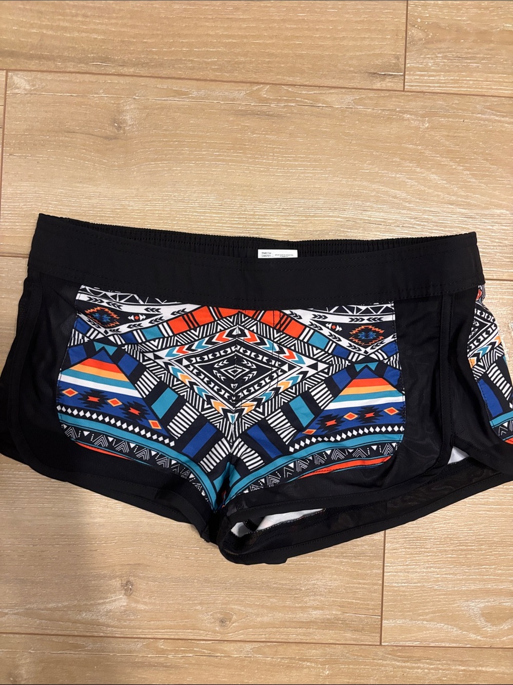 Rip Curl Black Athletic Shorts with Multicolor Geometric Panel Medium